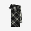 Elegant checkered wool-blend scarf folded neatly, showcasing its timeless pattern.