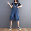 Baggy denim jumpsuit featuring adjustable suspenders and high waist design for effortless spring fashion