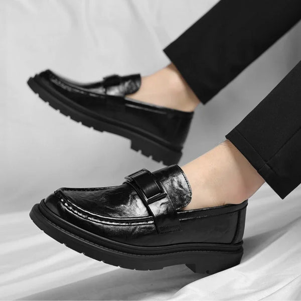 Men's dress loafers featuring a durable rubber outsole for longevity.