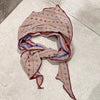 Trendy neck kerchief with a boho chic aesthetic.