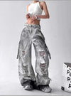 Trendy high-waist wide-leg ripped jeans for women with tie-dye and distressed detailing, perfect for casual street style.