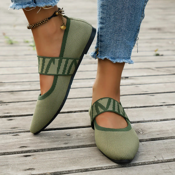 Detail of soft knitted fabric and mixed-color pattern on elegant pointed toe flats