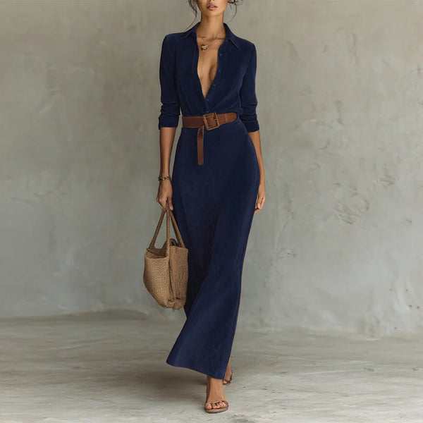 Autumn Whispers dress displayed on a mannequin, showcasing its timeless design and rich color.