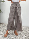 Floral wide-leg chiffon pants for women, ankle-length, elastic waist, perfect for summer fashion and casual chic outfits.