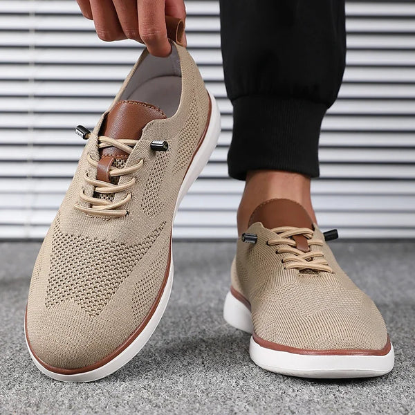 Lightweight men's walking shoes in gray featuring cushioned insole and low-profile design