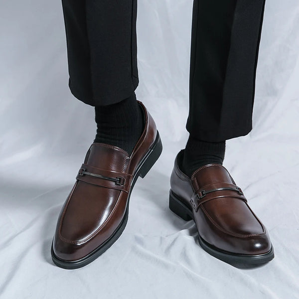 Executive loafers with reinforced stitching for added durability.