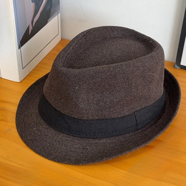 Timeless wool hat in brown, ideal for seasonal wear.