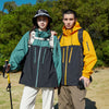 Men's waterproof hiking and urban windbreaker jacket with full-zip closure, oversized fit, and ribbed cuffs for warmth.