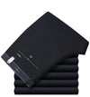 Classic men's dress pants in premium cotton, perfect for business and casual wear with a sleek straight leg design.