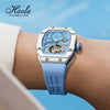 Luminous details of the Timeless Elegance watch glowing in low light.