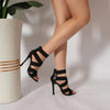 Stylish navy blue stiletto sandals with premium PU upper and rubber outsole.