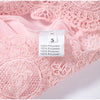 Back view of sleeveless lace top paired with palazzo pants