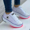 Casual platform sneakers featuring color-block pattern and medium platform heel