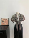 Soft polyester scarf with a stylish vintage pattern, perfect for casual wear.