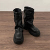 Chic women's mid-calf biker boots with buckle detail, cozy plush lining, and durable rubber sole for stylish winter wear.