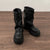 Chic women's mid-calf biker boots with buckle detail, cozy plush lining, and durable rubber sole for stylish winter wear.