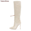 Elegant black suede stiletto boots ideal for autumn outings.