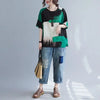 Versatile linen blend top in light gray, perfect for warm weather.