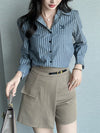 Chic striped blouse for office elegance, featuring a turn-down collar and single-breasted closure, perfect for professional w