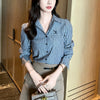 Chic striped blouse for office elegance, featuring a turn-down collar and single-breasted button front, perfect for professio