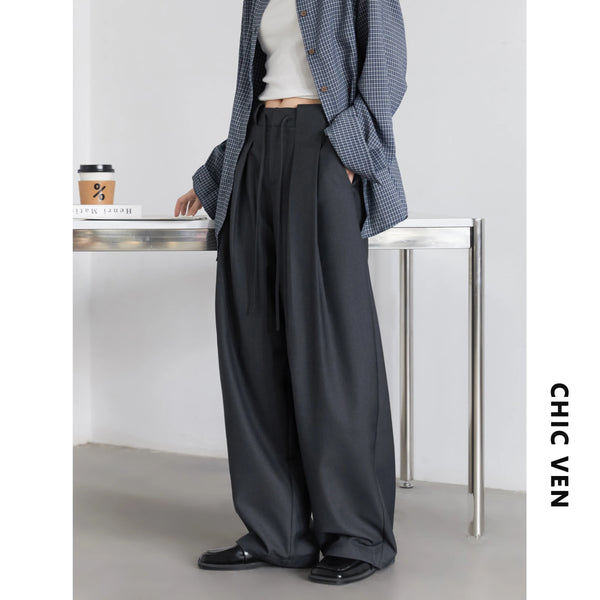 Versatile wide leg pleated pants with drawstring waist perfect for office to evening wear