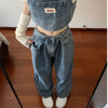 High-waist vintage denim straight-leg jeans for women, featuring a flattering fit and lightweight, durable fabric.