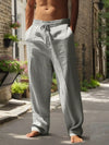 Airy wide leg pants in natural linen fabric with adjustable waist