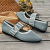 Knitted flats showing elastic band closure and durable rubber outsole for all-day comfort