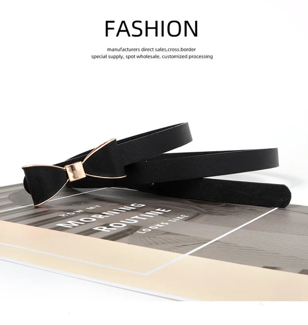 Elegant women's belt with bow detail in faux leather, perfect for casual and formal outfits, featuring a sleek metal buckle.