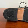 Casual office wear styled with handmade leather boots.