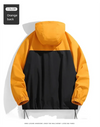 Men's waterproof hiking and urban windbreaker jacket with full-zip closure, oversized fit, and ribbed cuffs for warmth.