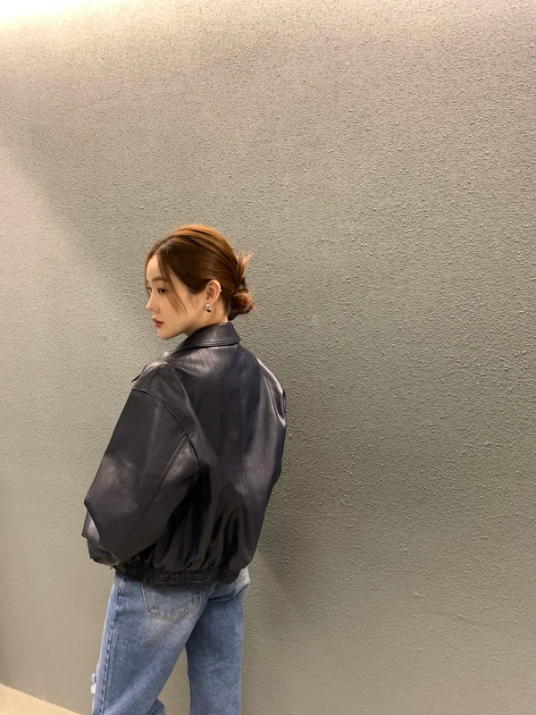 Chic cropped leather jacket for women in premium faux leather, perfect for autumn and winter streetwear fashion.