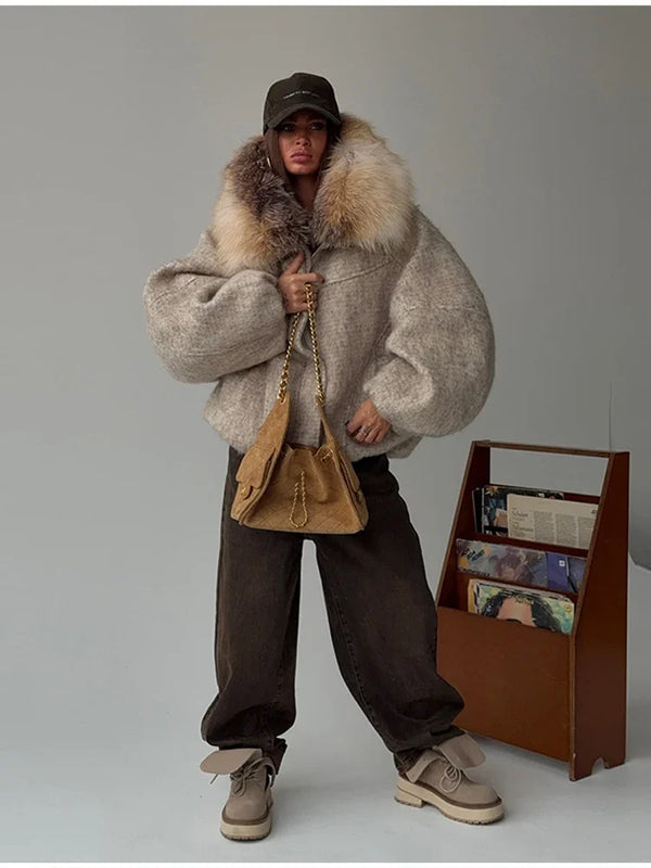 Front view of zipped Cozy Rebellion oversized hooded jacket