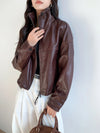 Model showcasing the versatility of the chic vintage leather cropped jacket.