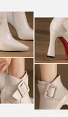 Back view of pointed leather pumps showing sleek heel and refined silhouette