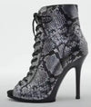 Fashion-forward snake-print boots with true-to-size comfortable fit