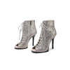 Runway-ready snake-print boots with leg-lengthening stiletto heel