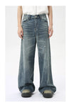 Casual washed blue jeans with wide leg silhouette and practical pockets