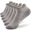 Moisture-wicking sports socks in white, designed to repel sweat and keep feet dry.