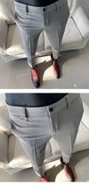 Slim fit business dress pants for men in black, khaki, and navy, perfect for autumn office wear and smart casual events.