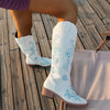 Embroidered mid-calf women's fashion boots with low wedge heel, slip-on design, and durable rubber outsole for comfort and st
