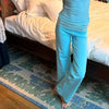 Women's striped pants with elastic waistband and feminine bow accent