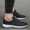 Versatile white athletic sneakers with multi-color accents for everyday wear