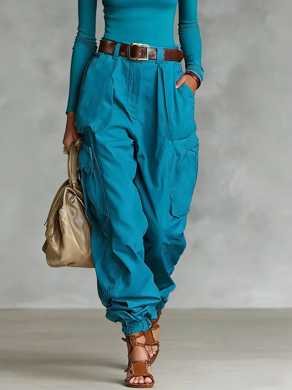 High-waist women's overalls with generous pockets in breathable fabric for warm weather