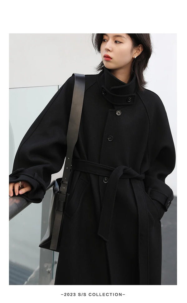 Sophisticated woolen outerwear with cinched waist and extended length design