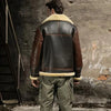 Close-up of the premium sheepskin leather on the bomber jacket.