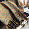 Versatile pashmina shawl styled for both casual and formal looks.