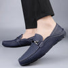 Breathable mesh lining in tan loafers for enhanced foot comfort.