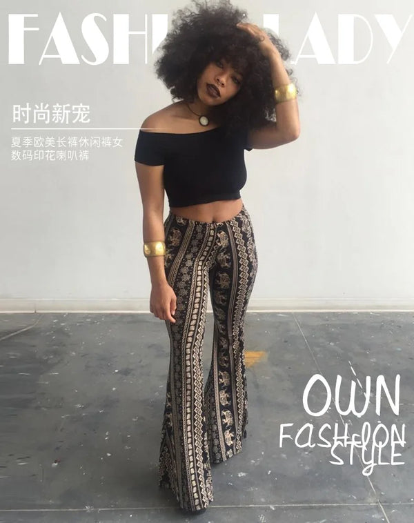 Bohemian flare leg pants for women with vibrant floral print, perfect for casual or festival wear in spring and summer.