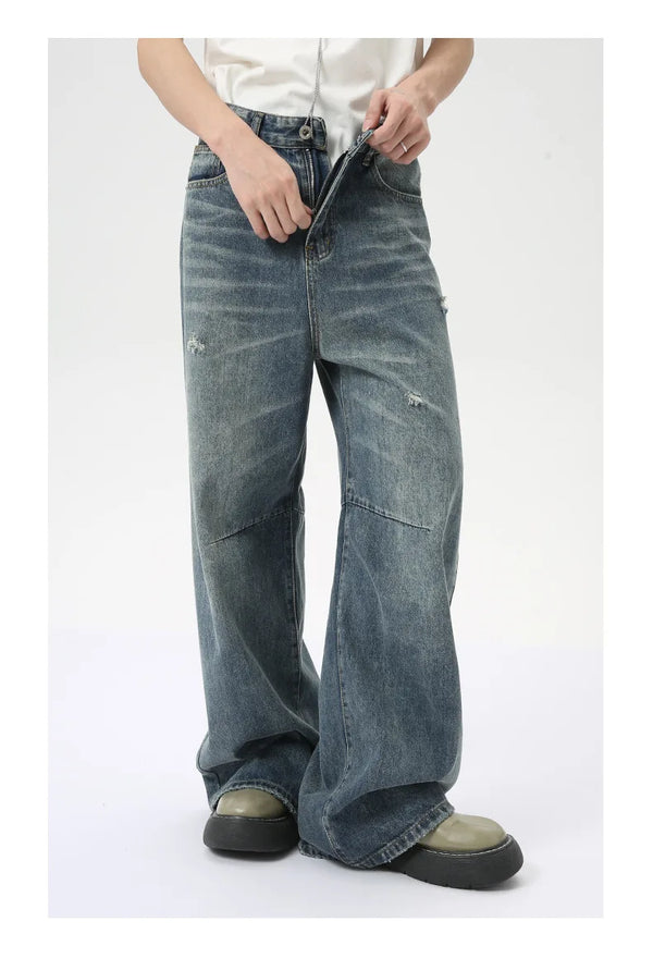 Men's vintage-style wide leg jeans in washed blue with comfortable fit